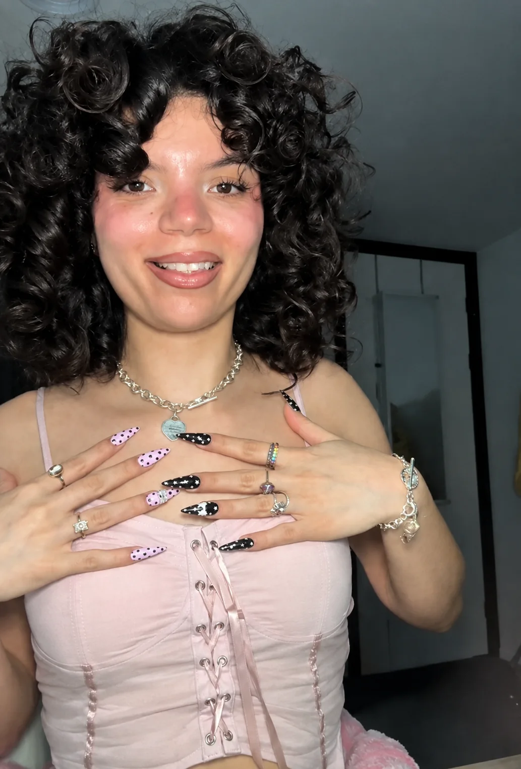 Customer styling silver jewelry, rings and charm bracelets