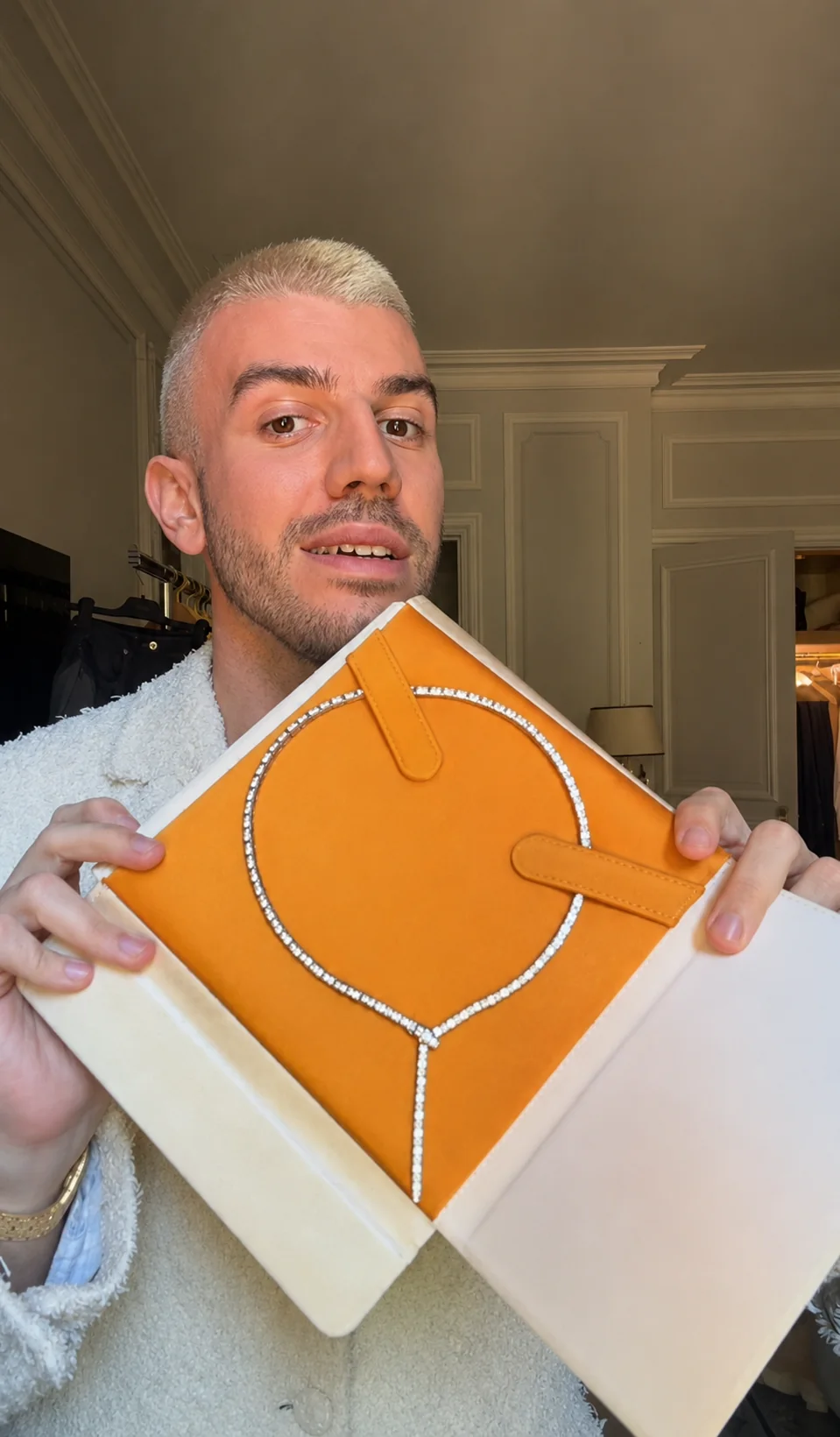 Customer presenting a diamond line necklace